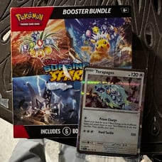 pokémon surging sparks booster pack with Terapagos Promo card