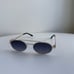 Miu Miu Oval Sunglasses