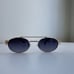 Miu Miu Oval Sunglasses