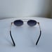 Miu Miu Oval Sunglasses