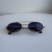 Miu Miu Oval Sunglasses