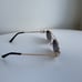 Miu Miu Oval Sunglasses
