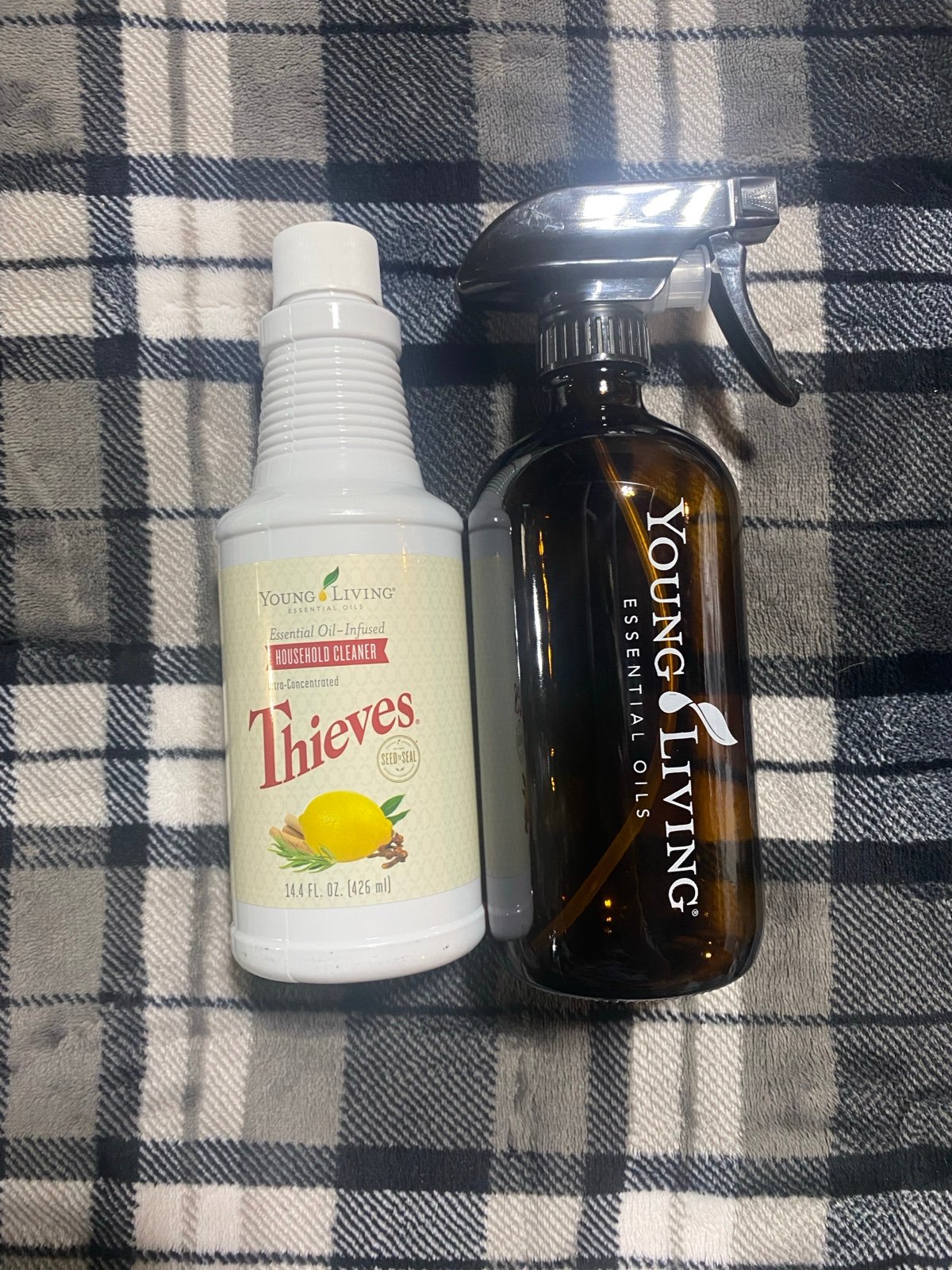 Young living thieves cleaner and spray bottle
