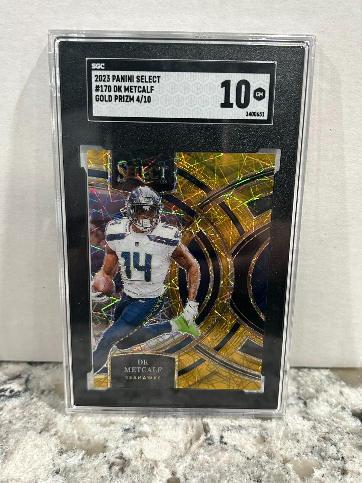 DK Metcalf 2023 Panini Select Gold Lazer Premier Level Prizm Numbered /10 SGC 10