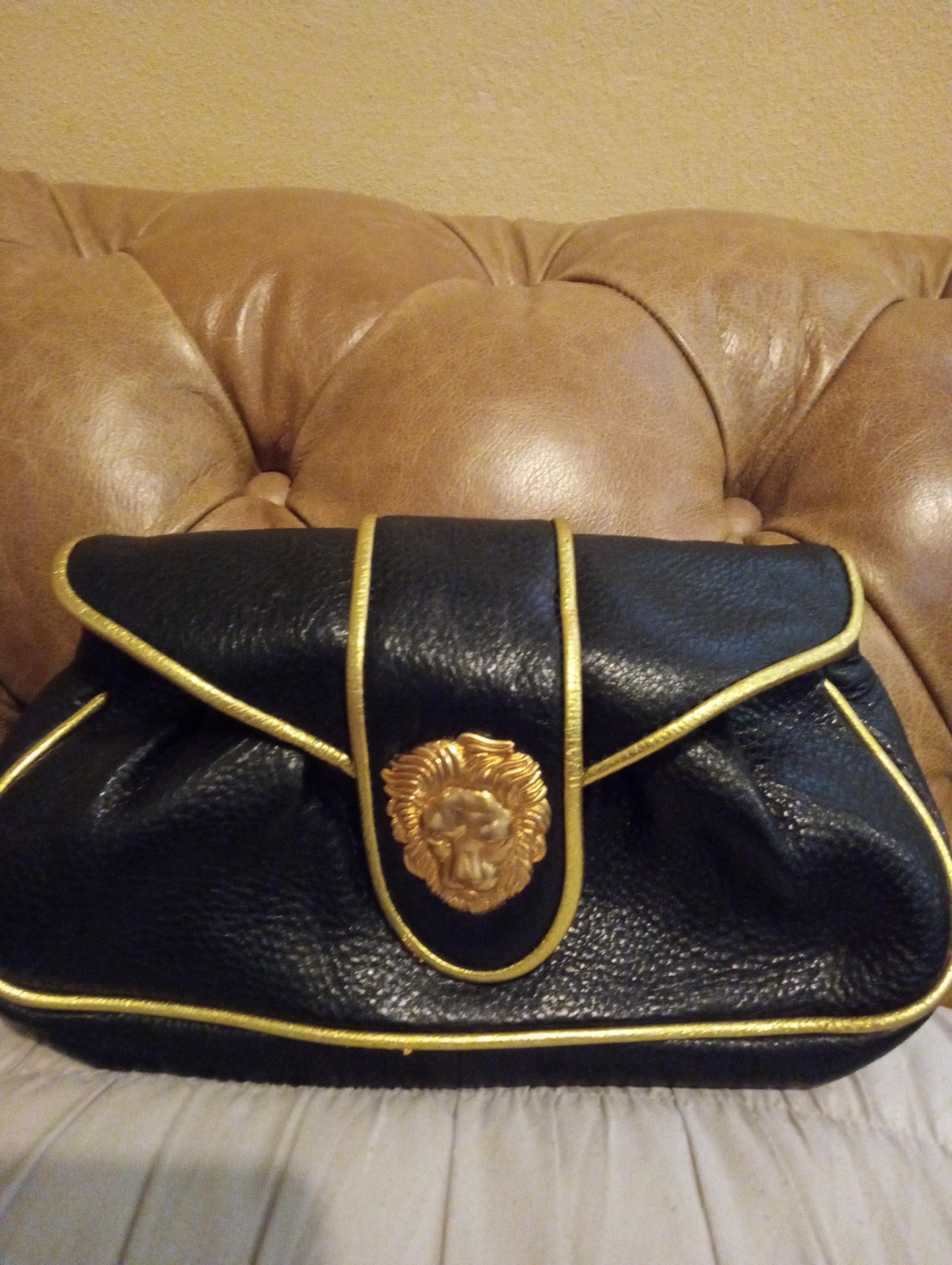Dooney & Bourke For Hayden Panettiere Limited Edition Pebbled Leather Clutch