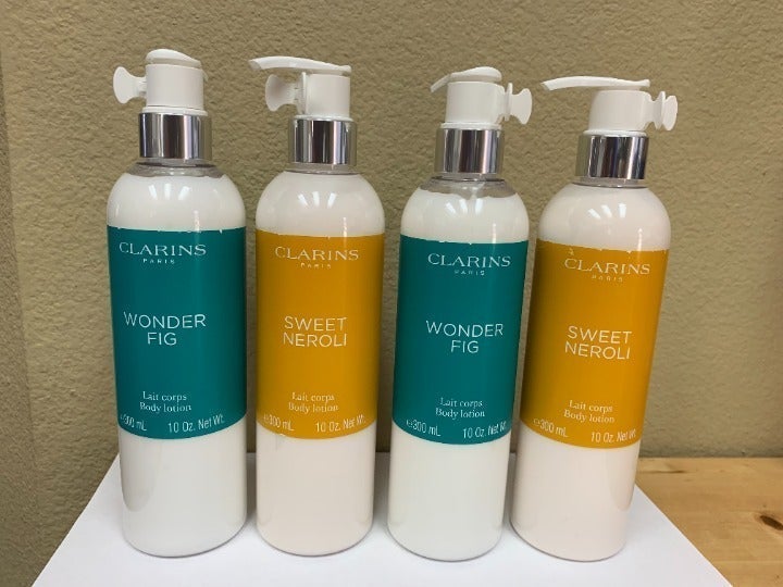 4 New Clarins Body Lotion, 10 oz.