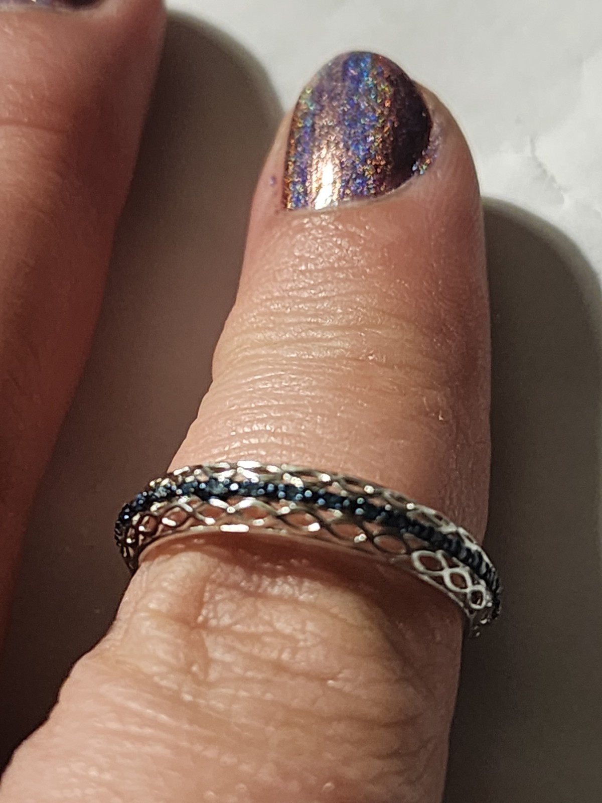 Blue diamond band ring.