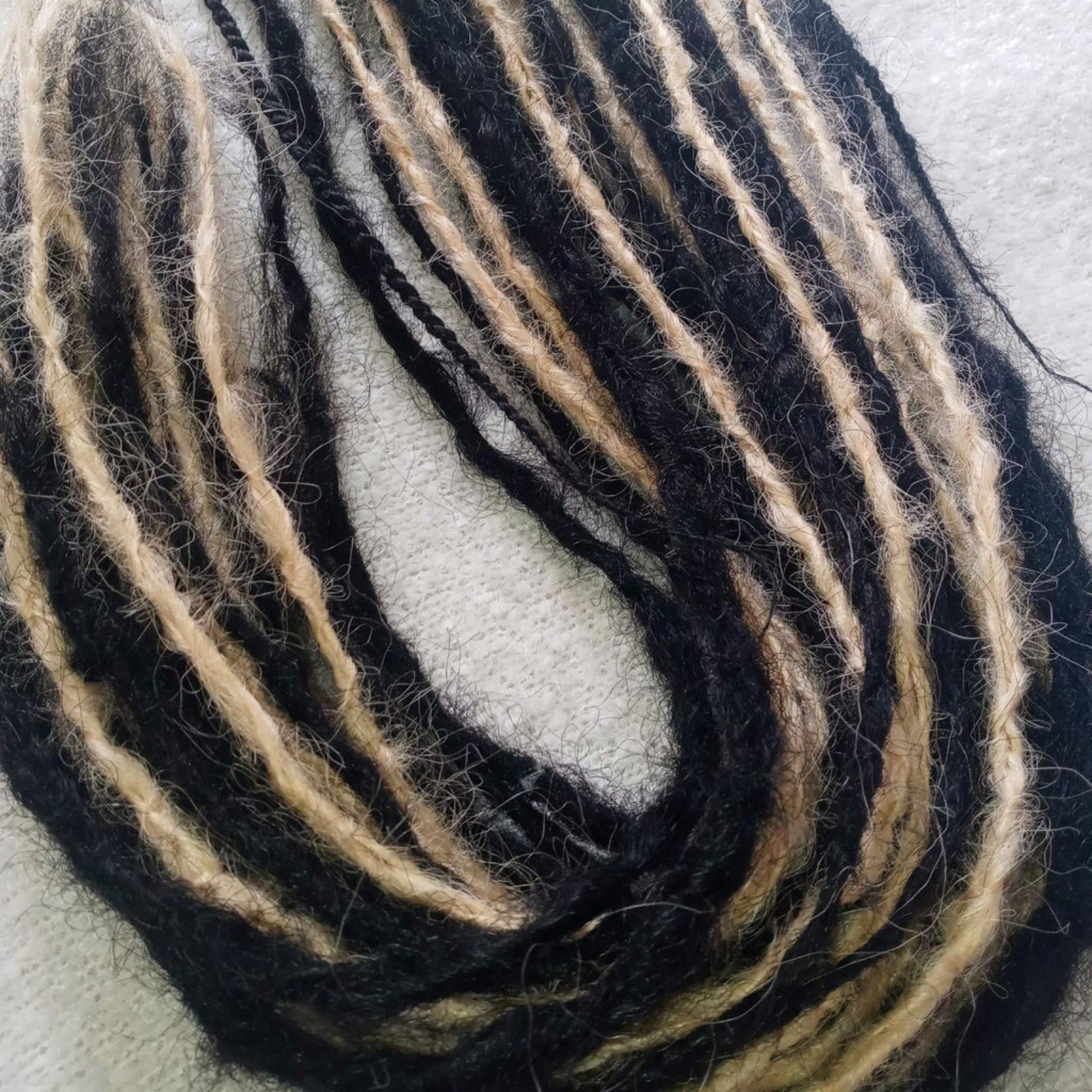 Long blonde ombre tie on dreadlocks