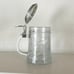 Glass beer stein with pewter lid