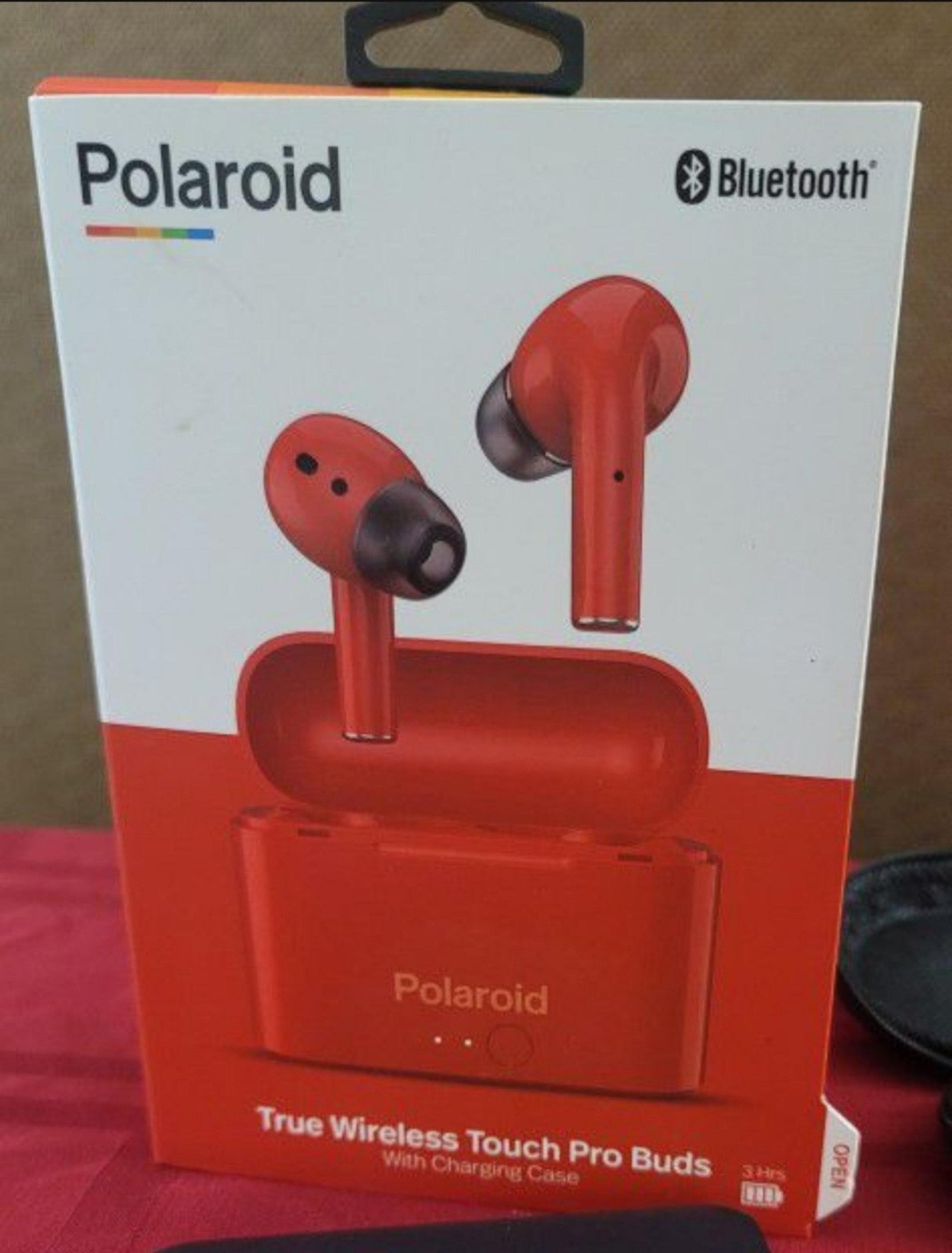new in the box polaroid bluetooth headset