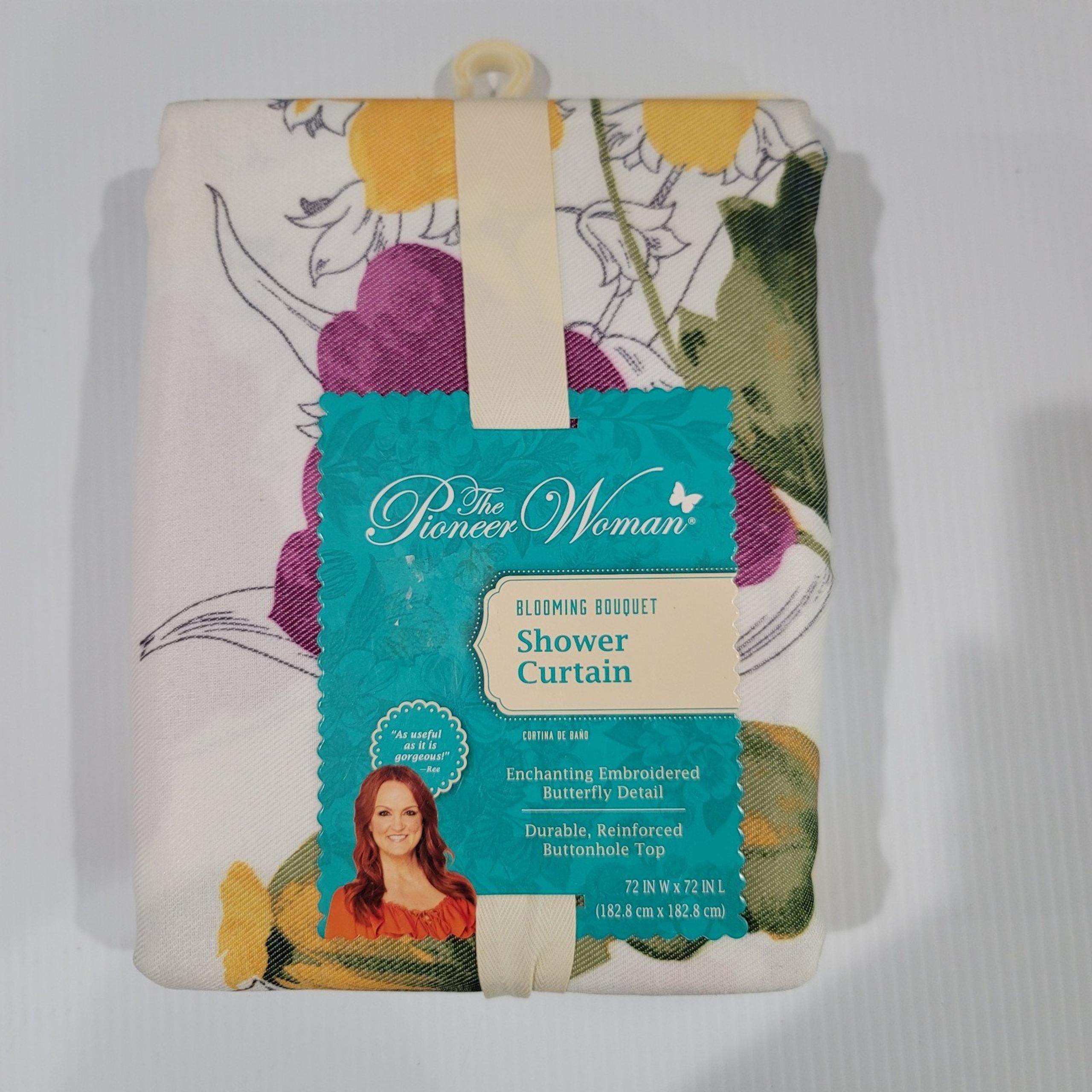 Aqua fabric shower curtain
Features medallion prints and chainstitch embroidery