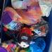 Container literally full of toys ( from McDonald’s toys to baby alive dolls )