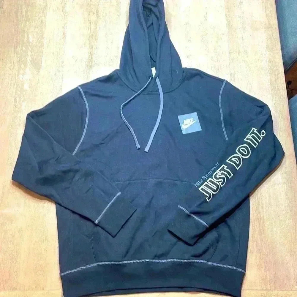 Nike hoodie, black with white lettering size Medium, perfect condition!