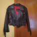 Black leather crop fringe jacked