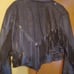 Black leather crop fringe jacked