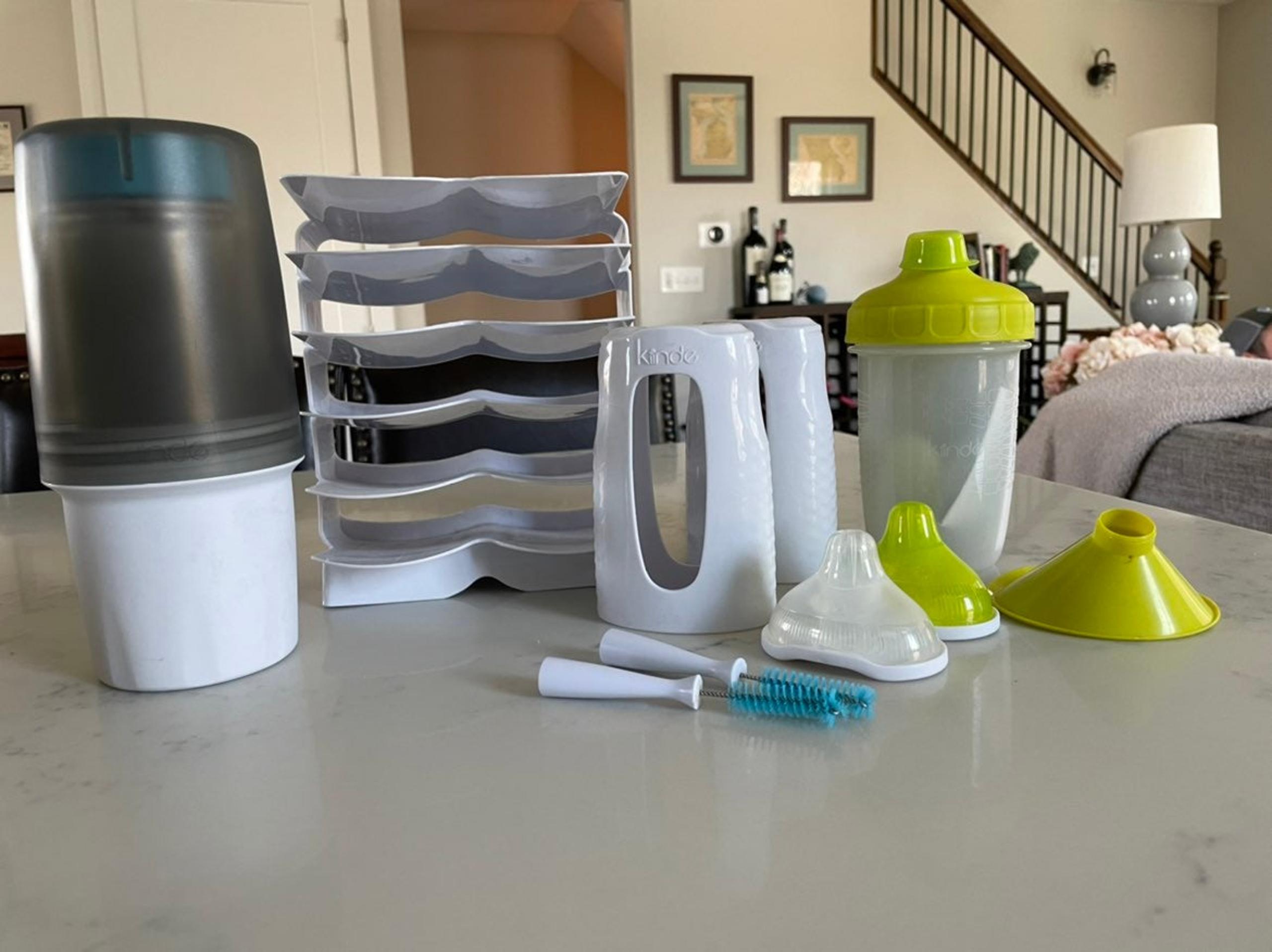 Kiinde Kozii Travel Warmer, Twist Keeper, Twist Squeeze Bottle, and Twist Foodi