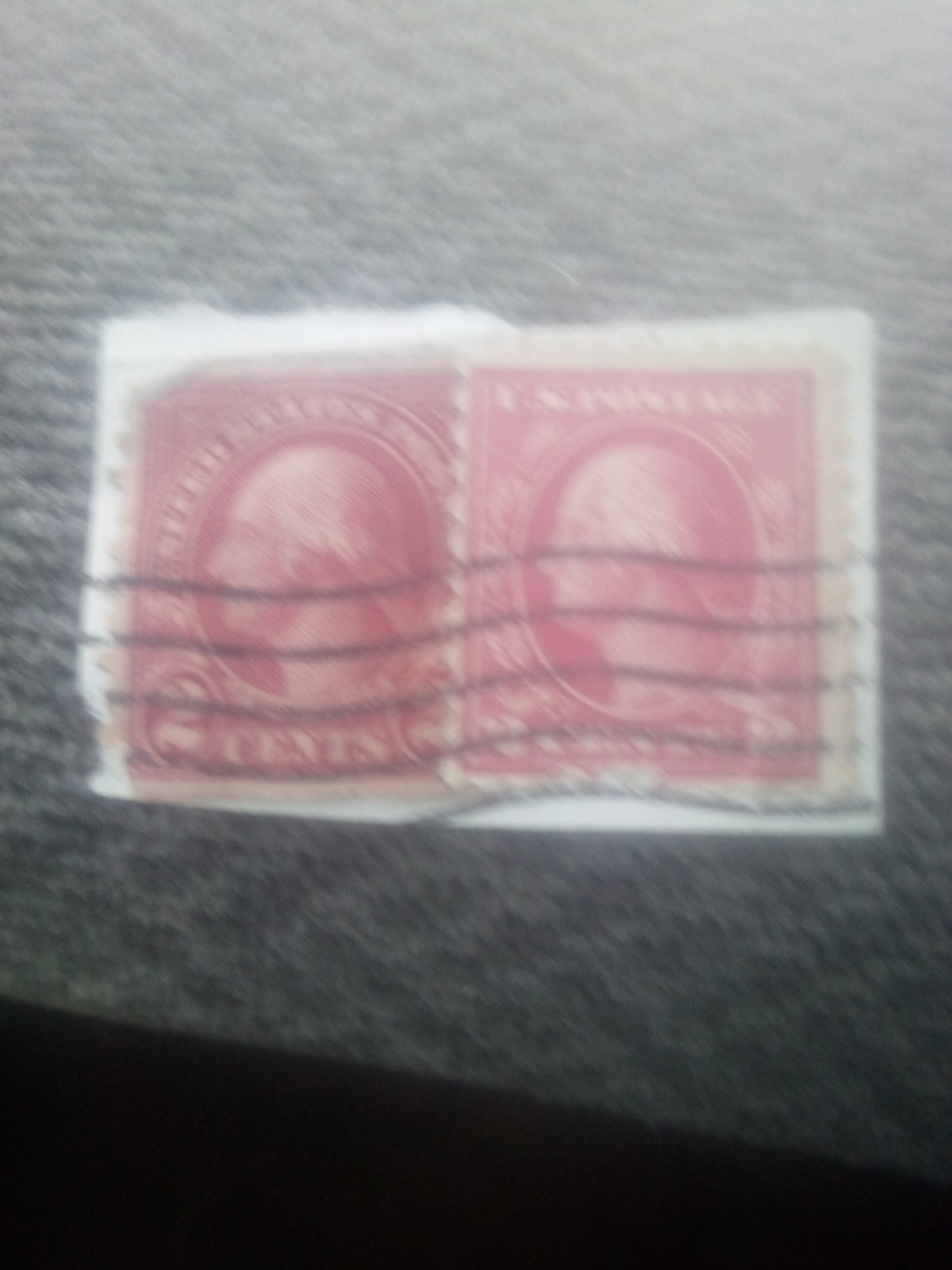Two very rare 1923 two cent red postage stamps