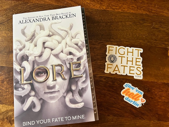 Hand SIGNED Foiled Paperback Edition of Lore by Alexandra Bracken with Stickers