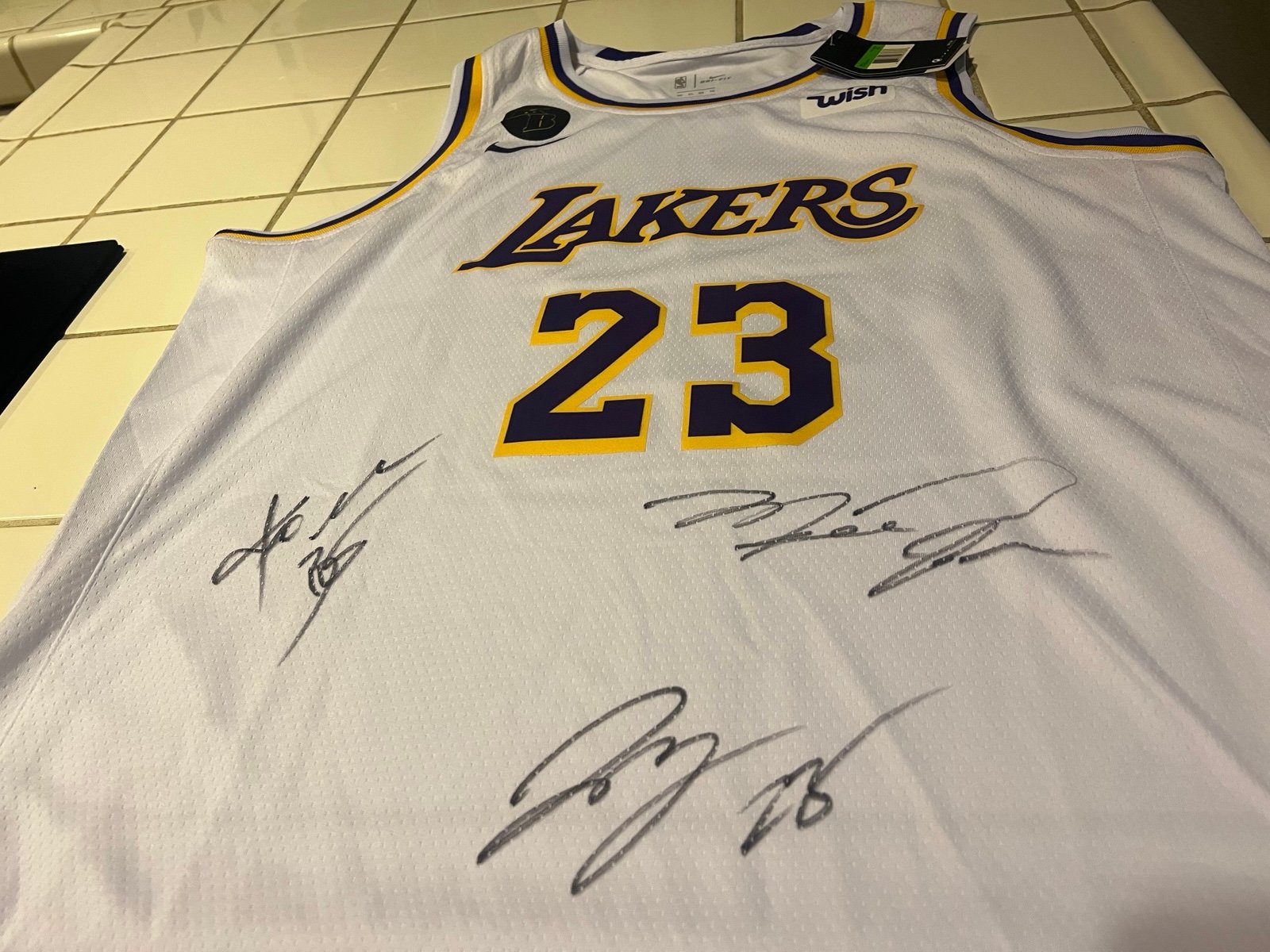 Kobe / Jordan / LeBron autographed LeBron Jersey.