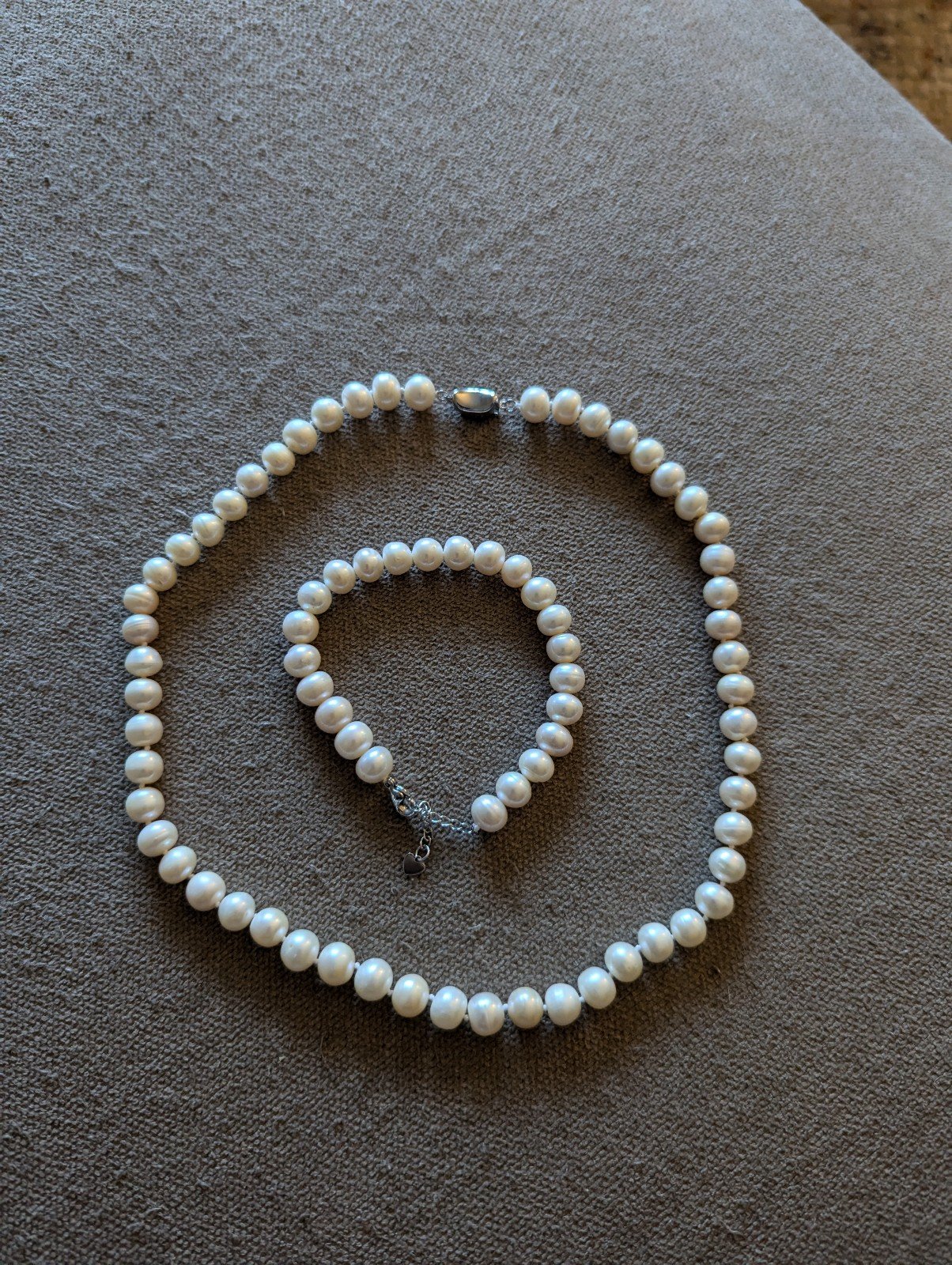 Matching pearl necklace and bracelet set