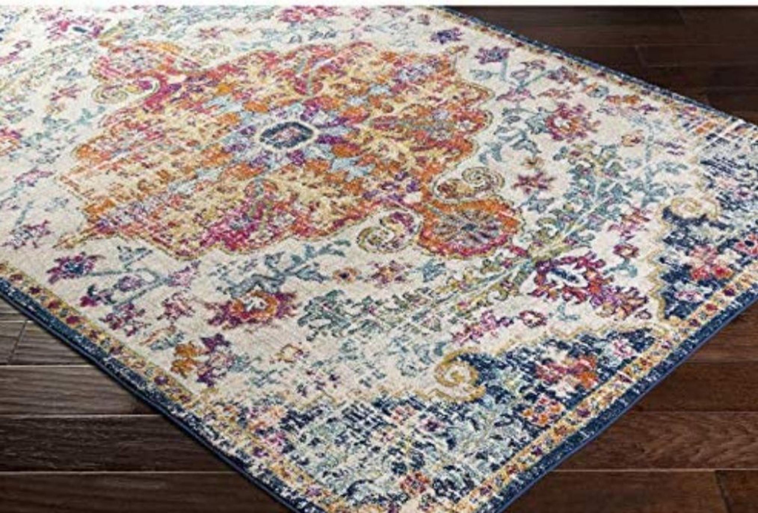 Orange/navy oriental pattern area rug 7'10" x 10"3 inches