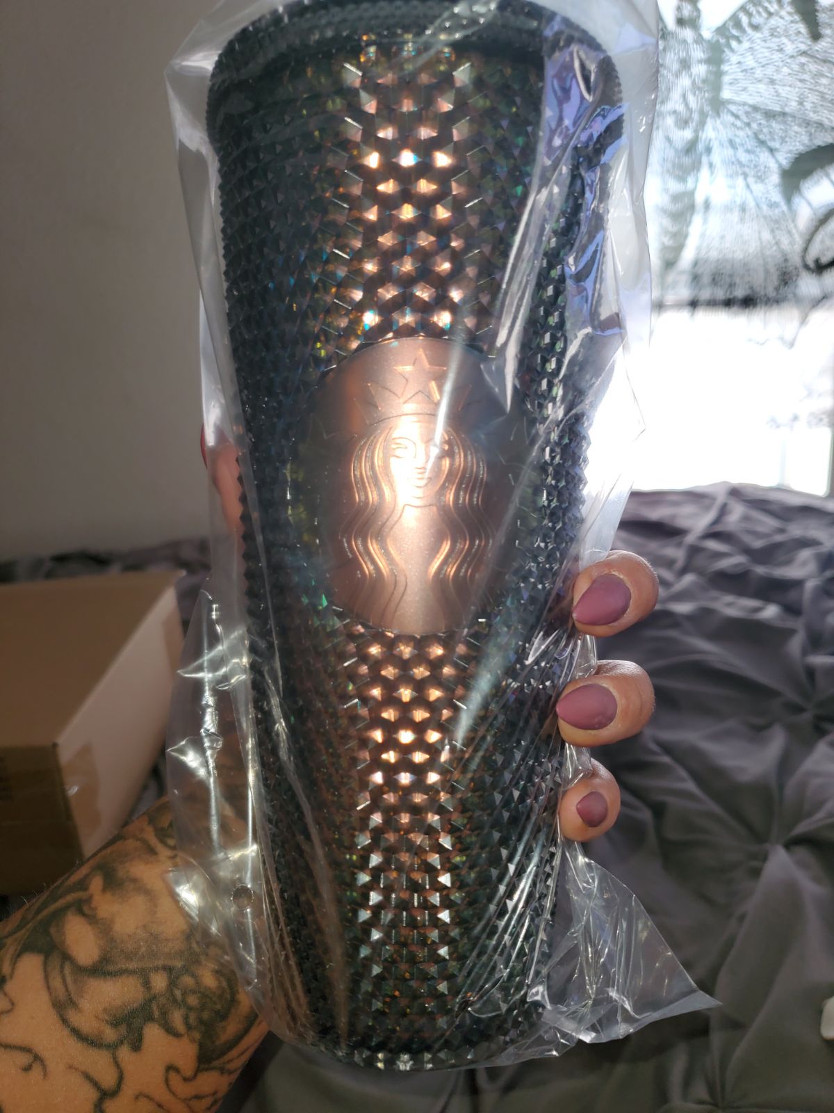 black studded Starbucks cup
