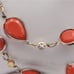 Glistening orange retro pearl necklace