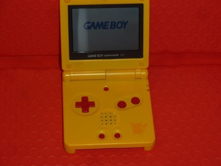 NINTENDO GAMEBOY ADVANCE SP POKEMON PIKACHU VERSION with CHARGER LIKE BRAND NEW