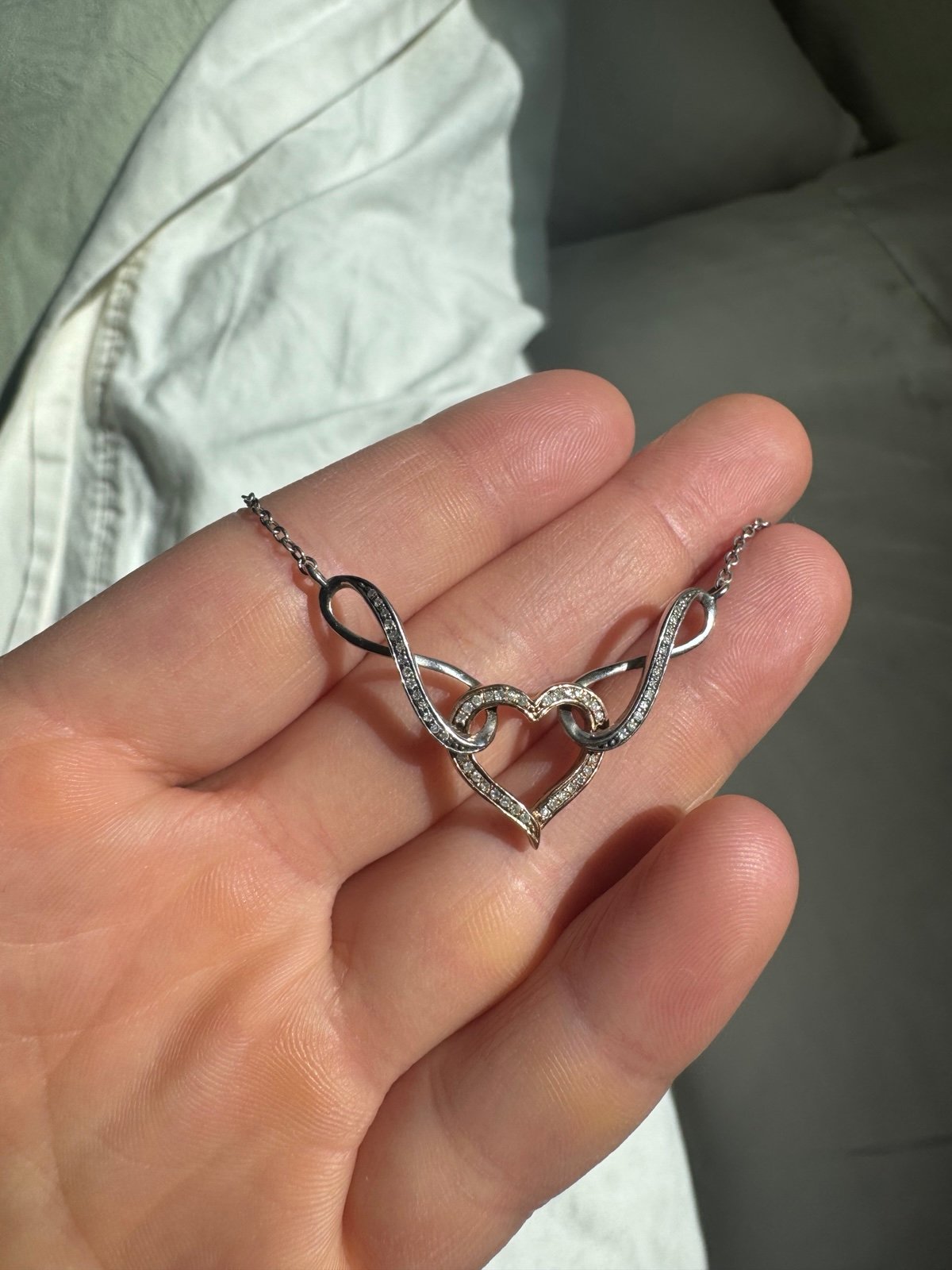 1/6 ct. tw. Diamond Infinity 18 Necklace in Sterling Silver and 10K Rose Gold
