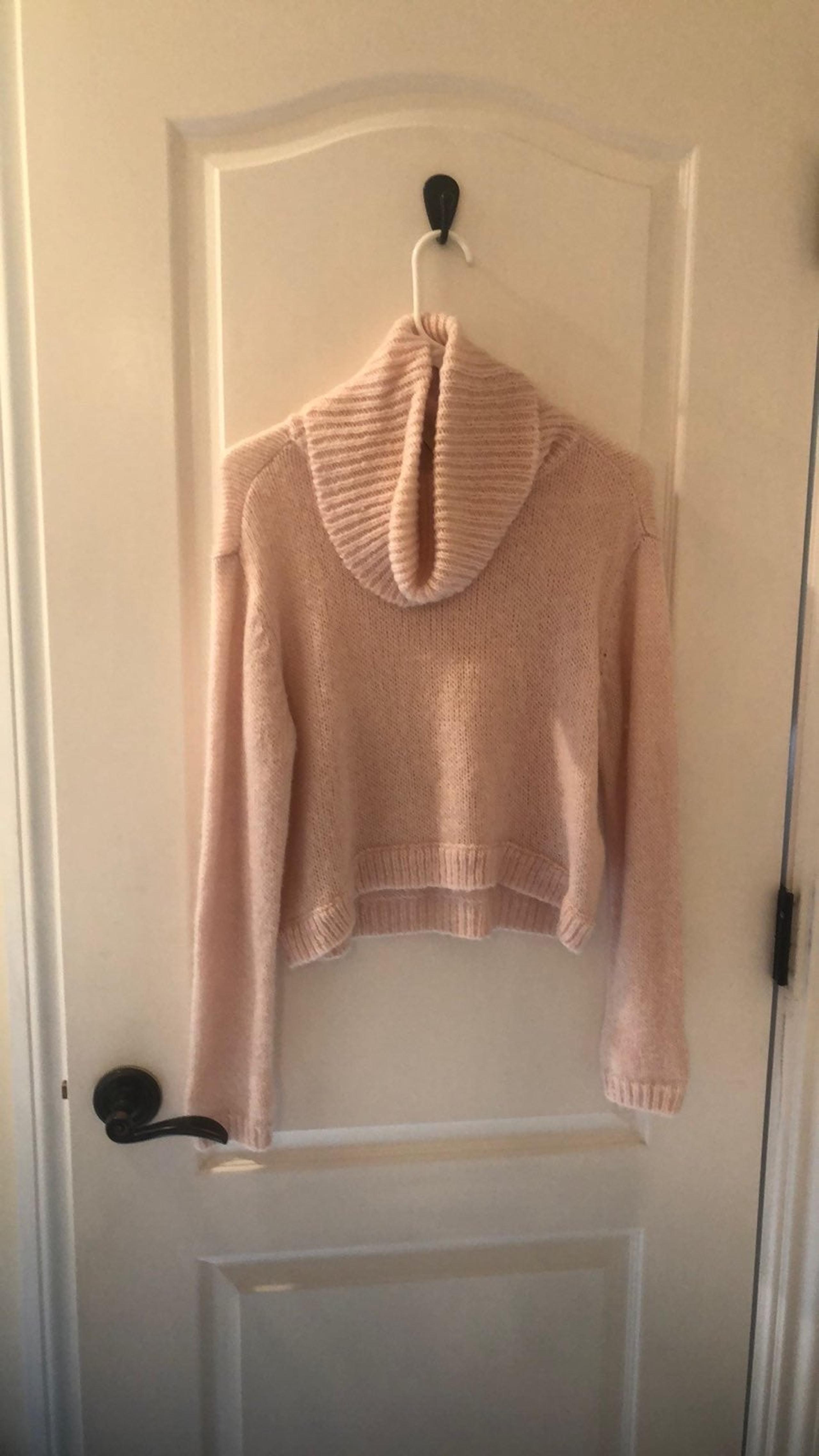 Baby pink turtleneck sweater