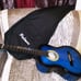 Blue and black palmer guitar