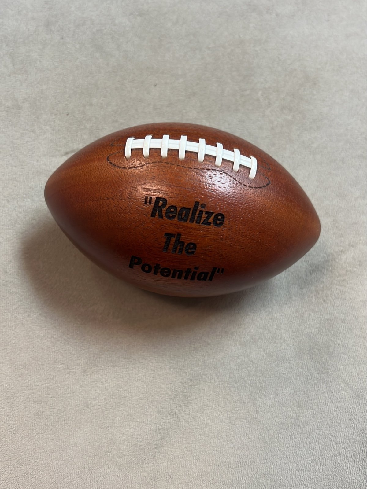 Wooden Football “Sayers” Realize the Potential