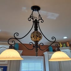 Two chandelier light fixture