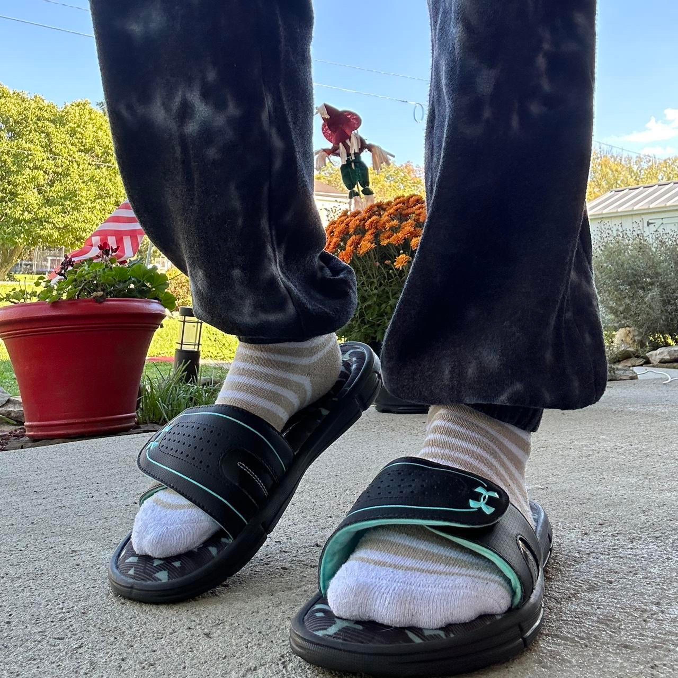 Black and blue camo Under Armour foam sandals