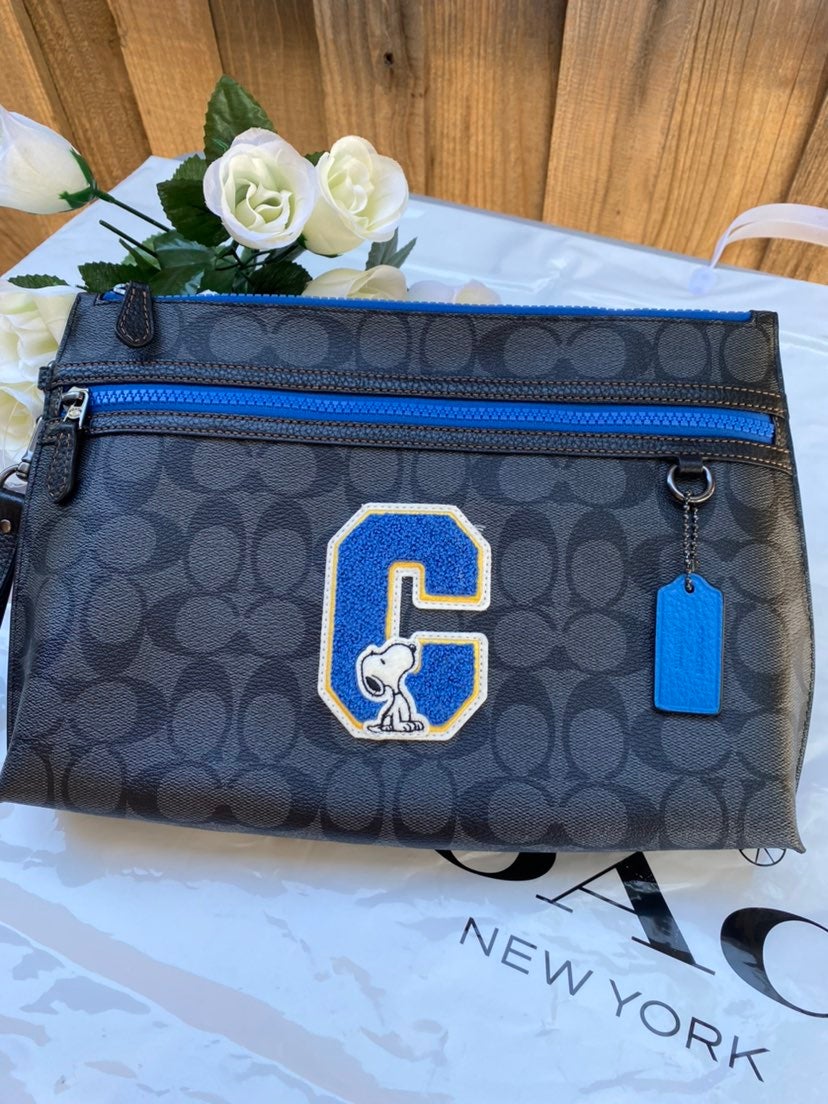 NWT Coach X Peanuts Carryall Pouch In Signature Canvas With Snoopy