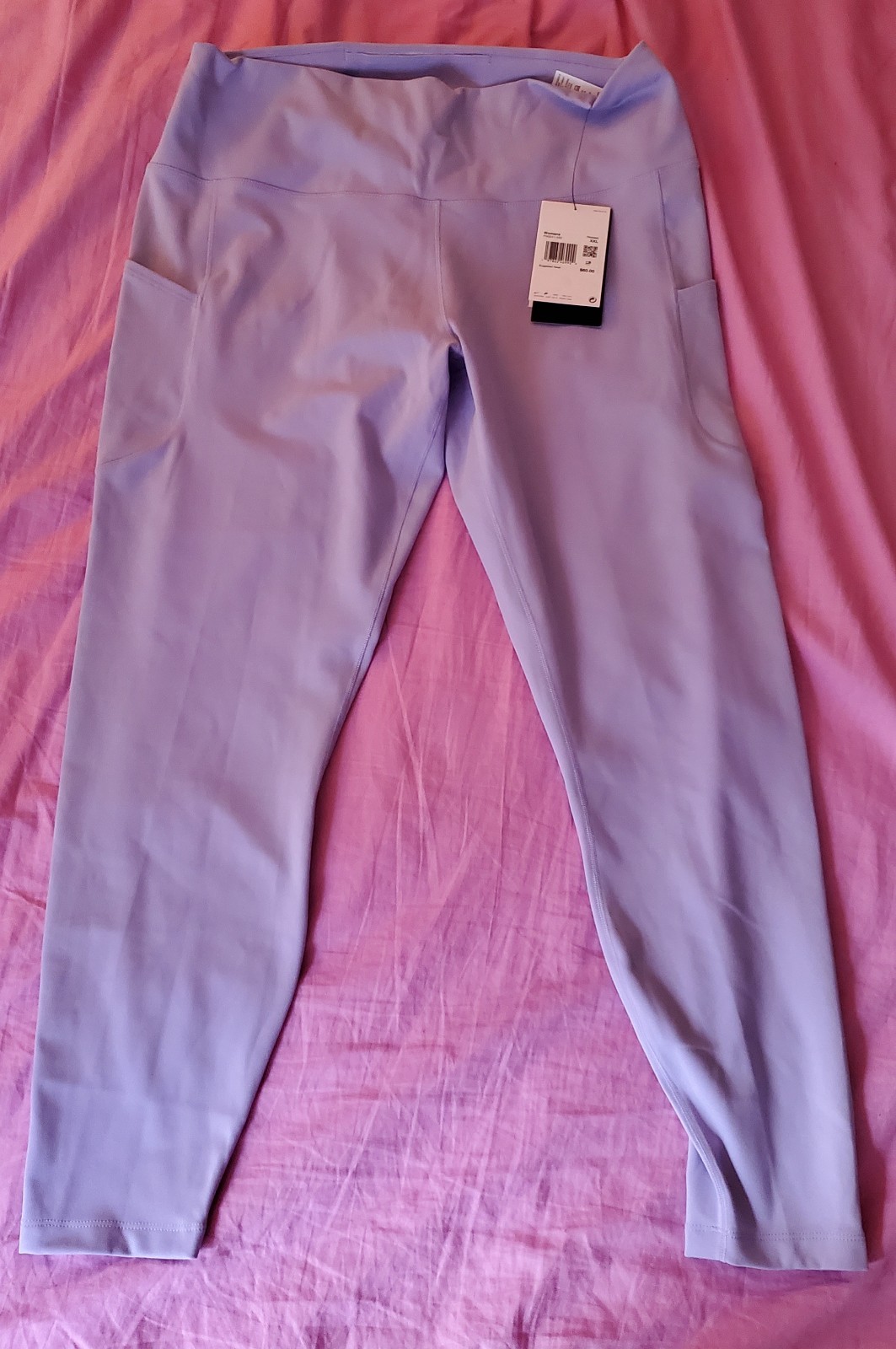 Nike womens 7/8 legging with pockets in lavender