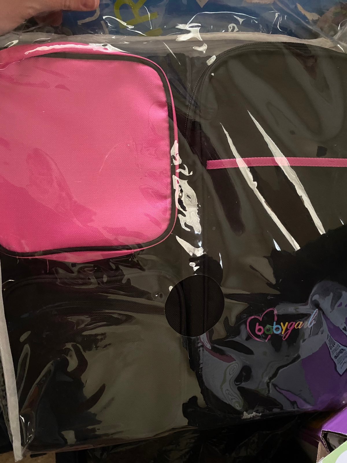 Diaper bag converts to travel bed