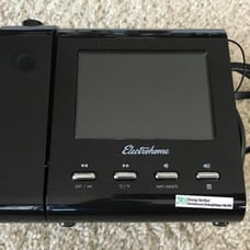 New Projection Alarm Clock with AM/FM Radio, Battery Backup, Auto Time Set