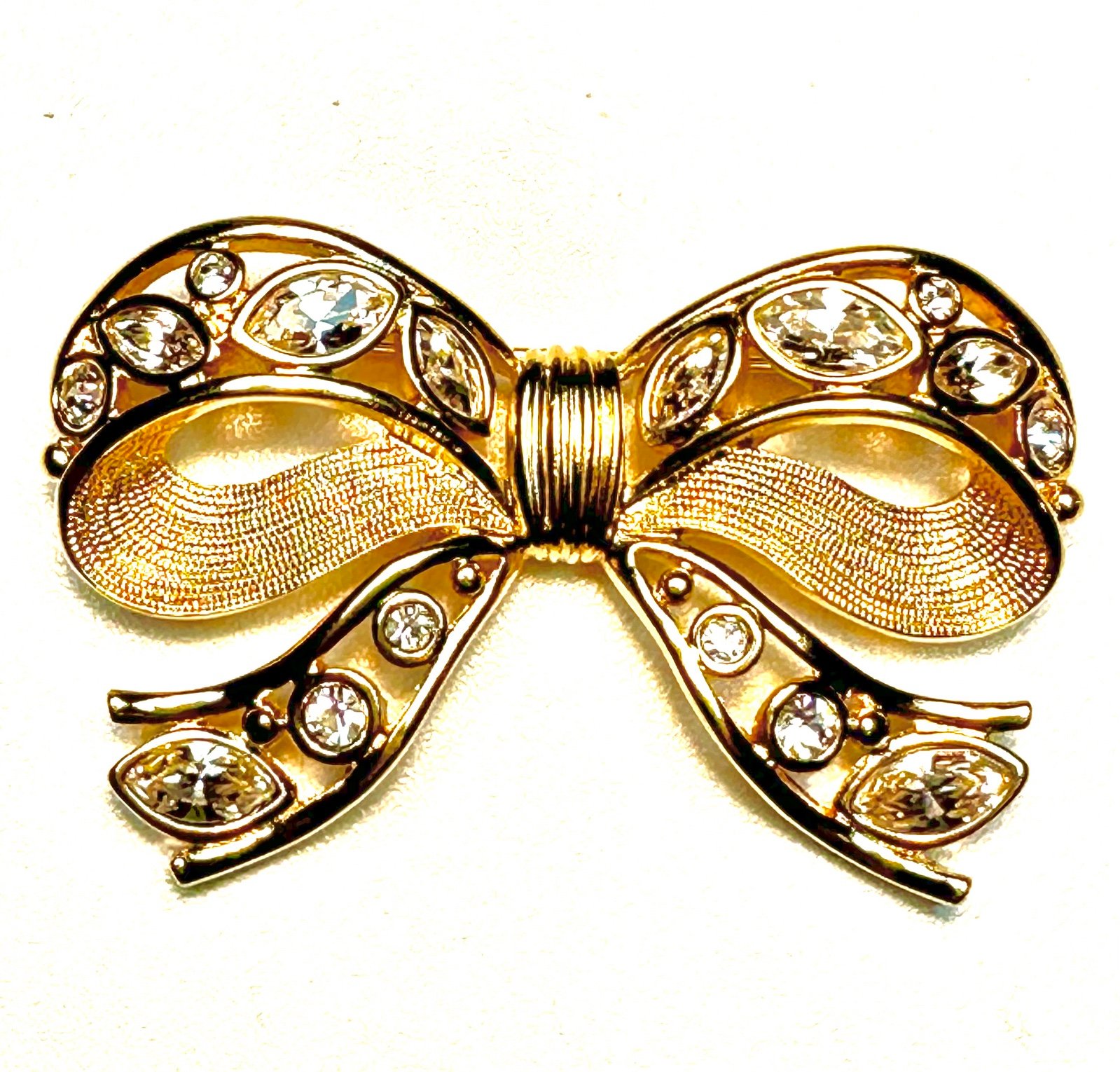 Swarovski brooch made of gold metal and crystals