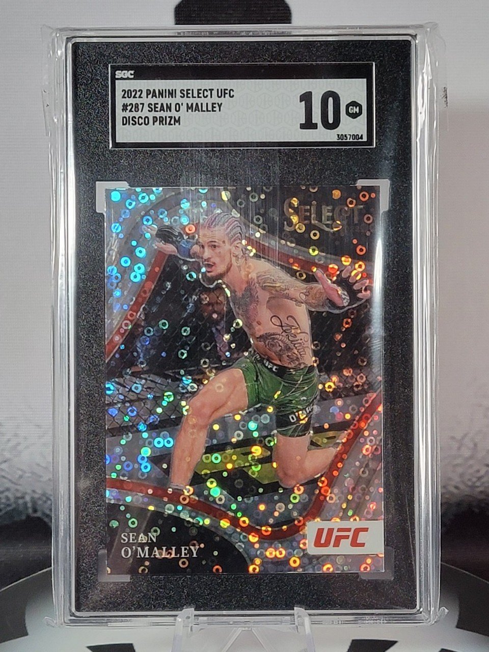 2022 Panini Select UFC Sean O’Malley Disco Prizm Octagonside - SGC 10 GEM MINT