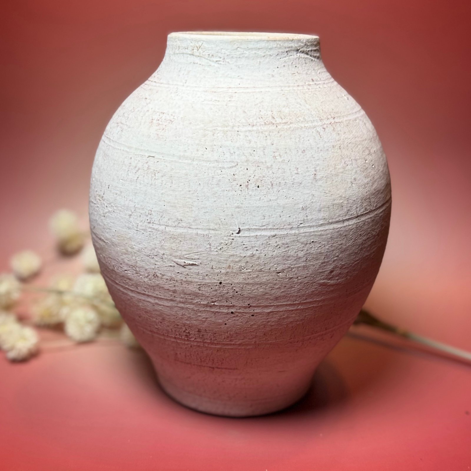 Terracotta Textured vessel vase.