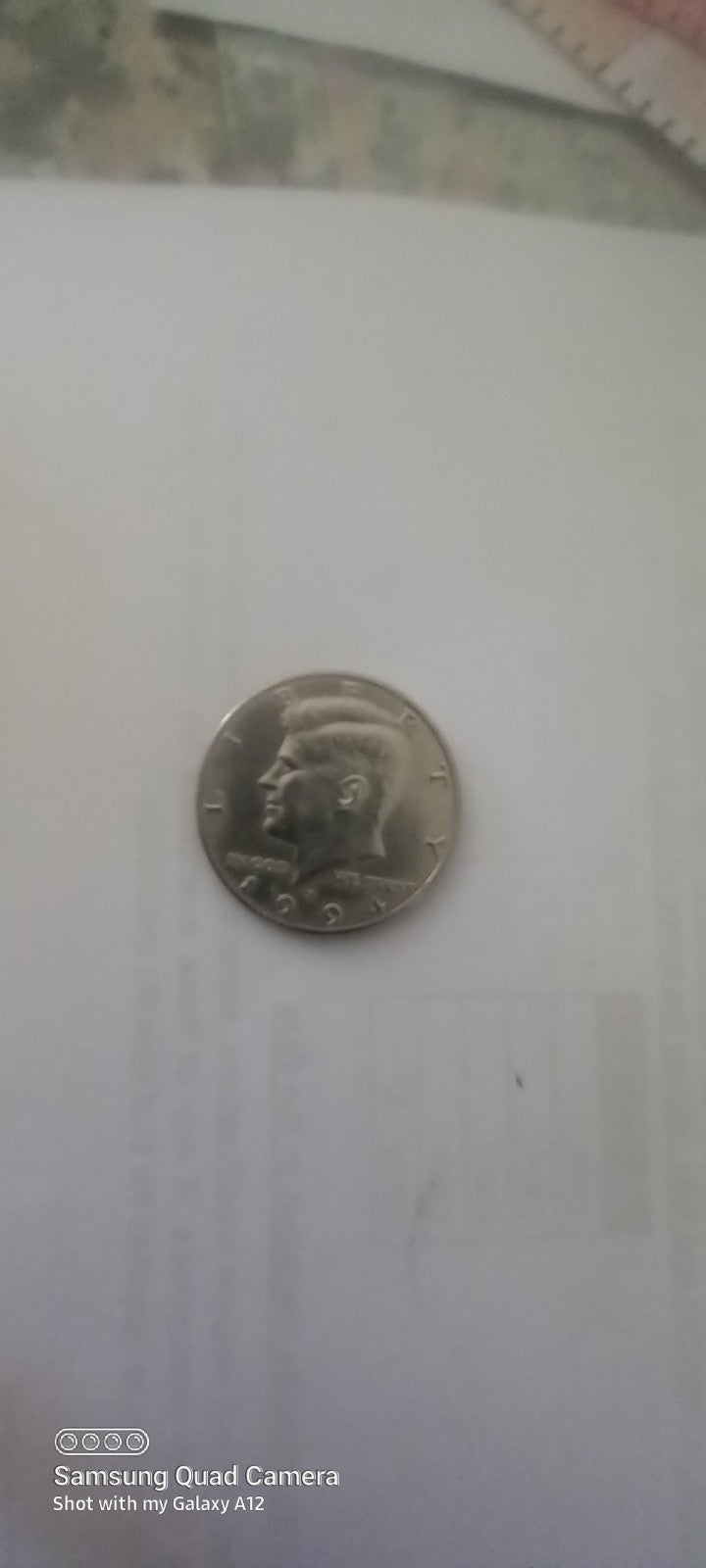 1994 D Lincoln Kennedy half dollar double strike strike under the neck