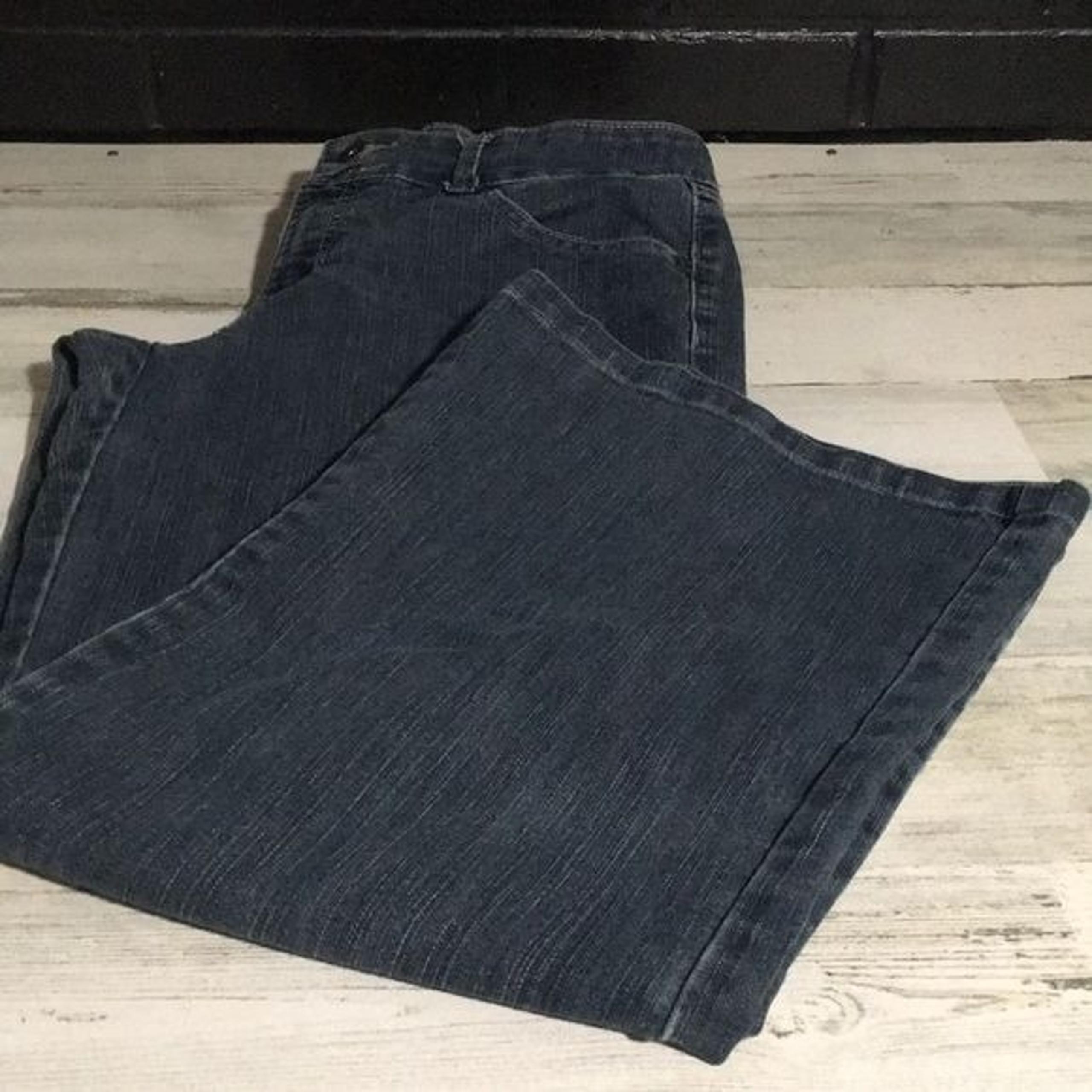 Jeanstar Premium Denim woman’s zip & button front wide leg jeans with pockets
