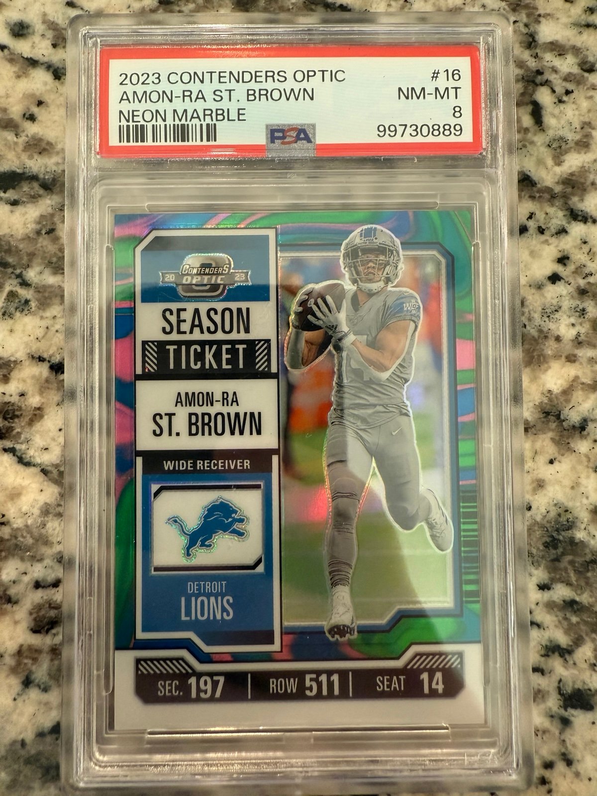 Amon-Ra St. Brown 2023 Contenders Optic Neon Marble Prizm /4 PSA 8 Lions