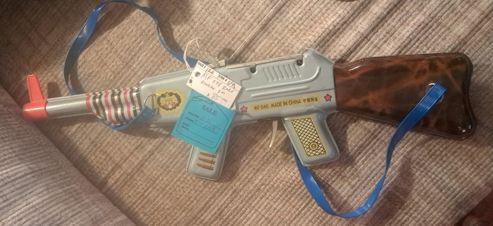 Tin toy gun