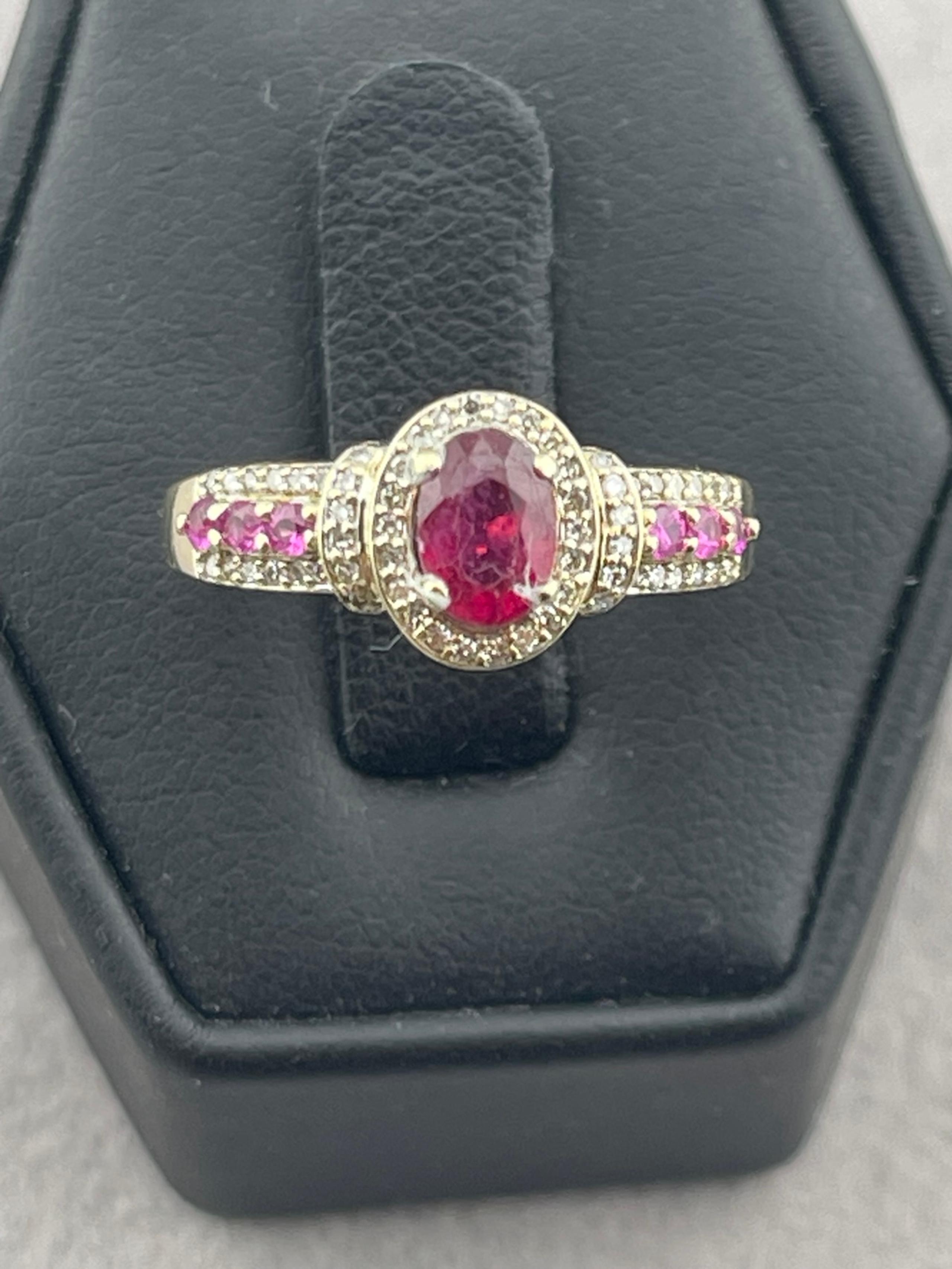 Vintage natural 1/2 carat ruby and 1/4 carat diamond ring 14 karat yellow gold