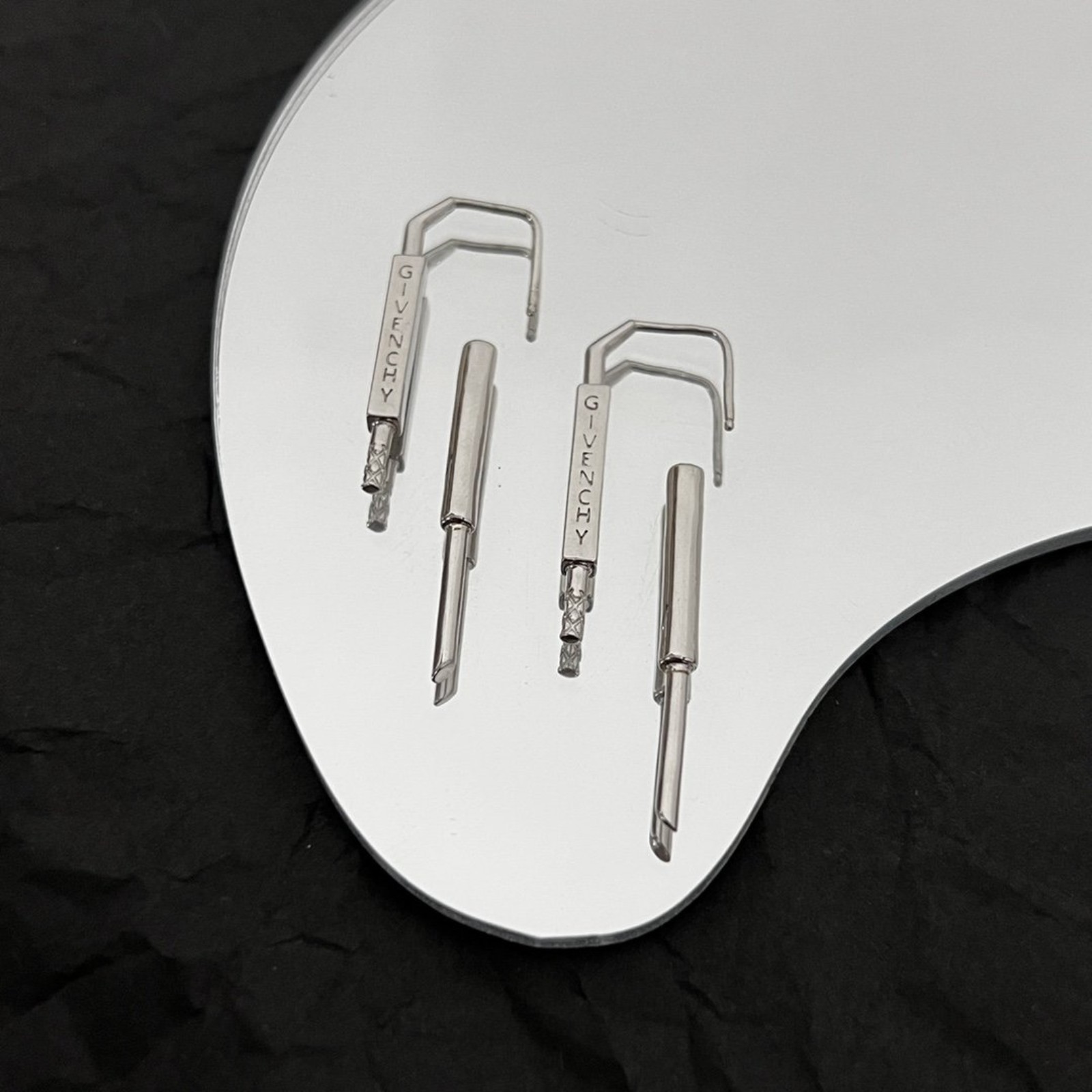 Silver fashion curved stud earrings