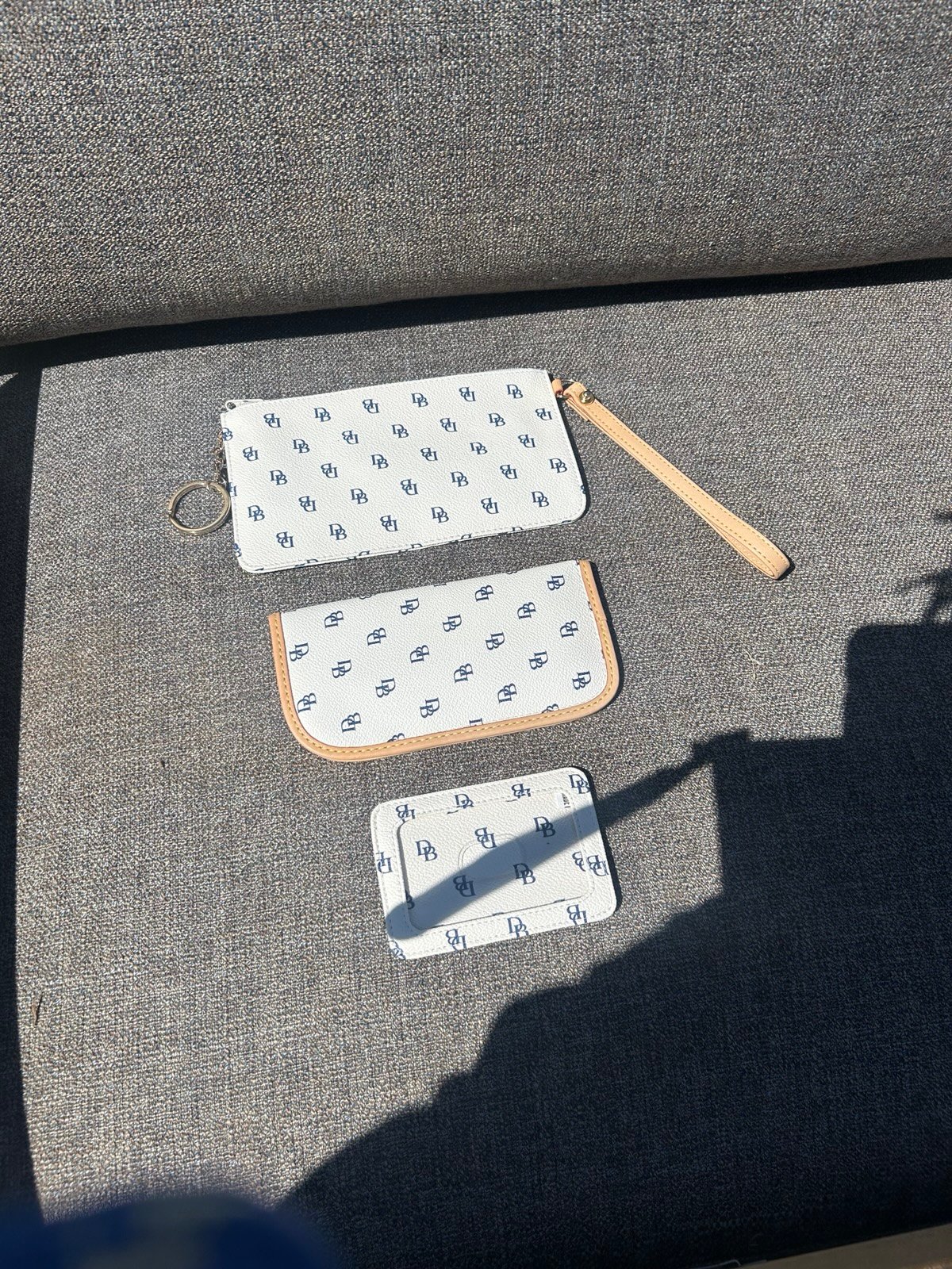 Dooney and Bourke wrist wallet, glasses case and ID holder