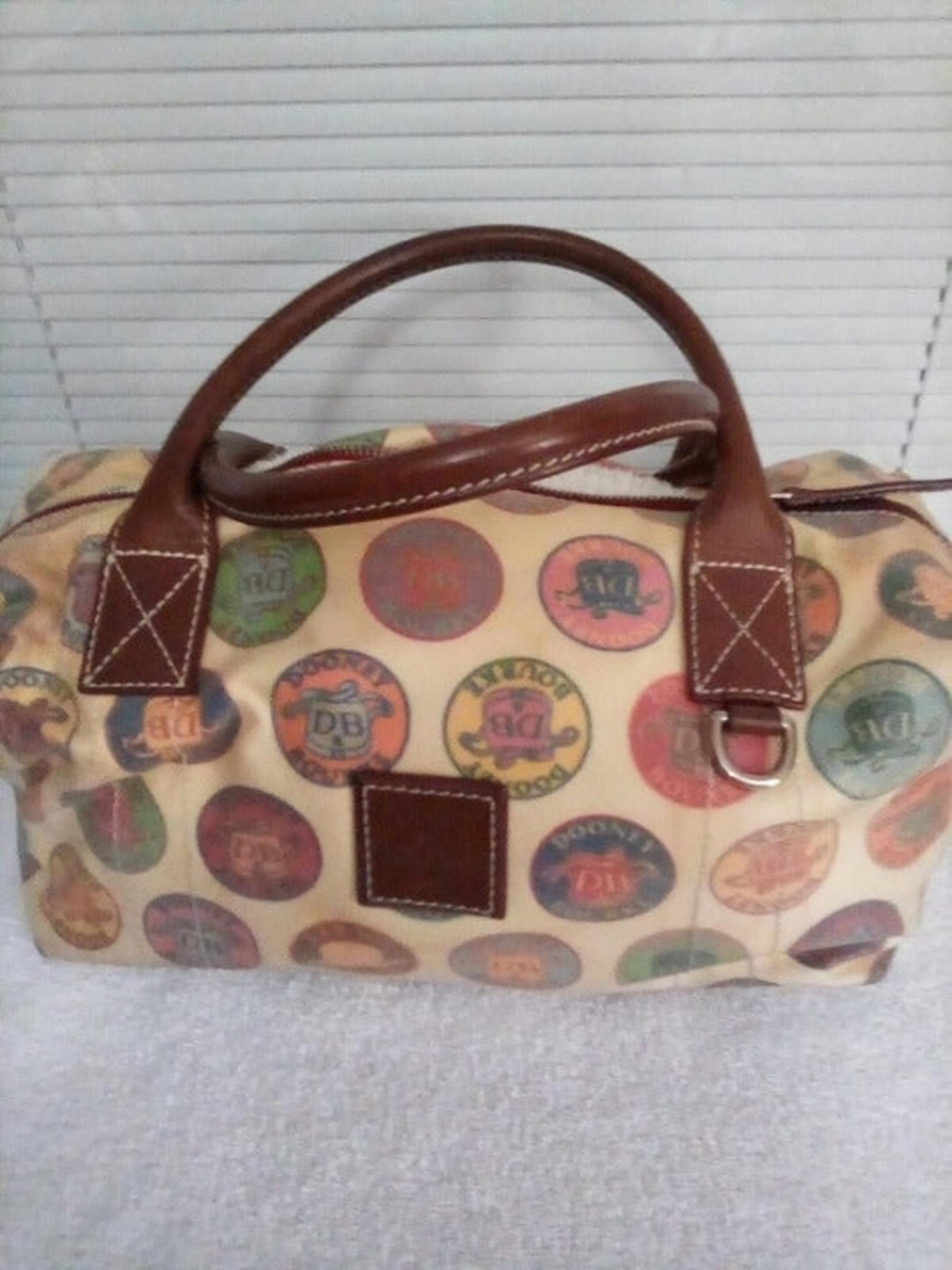 DOONEY & BOURKE VINTAGE MEDALLION HANDBA
