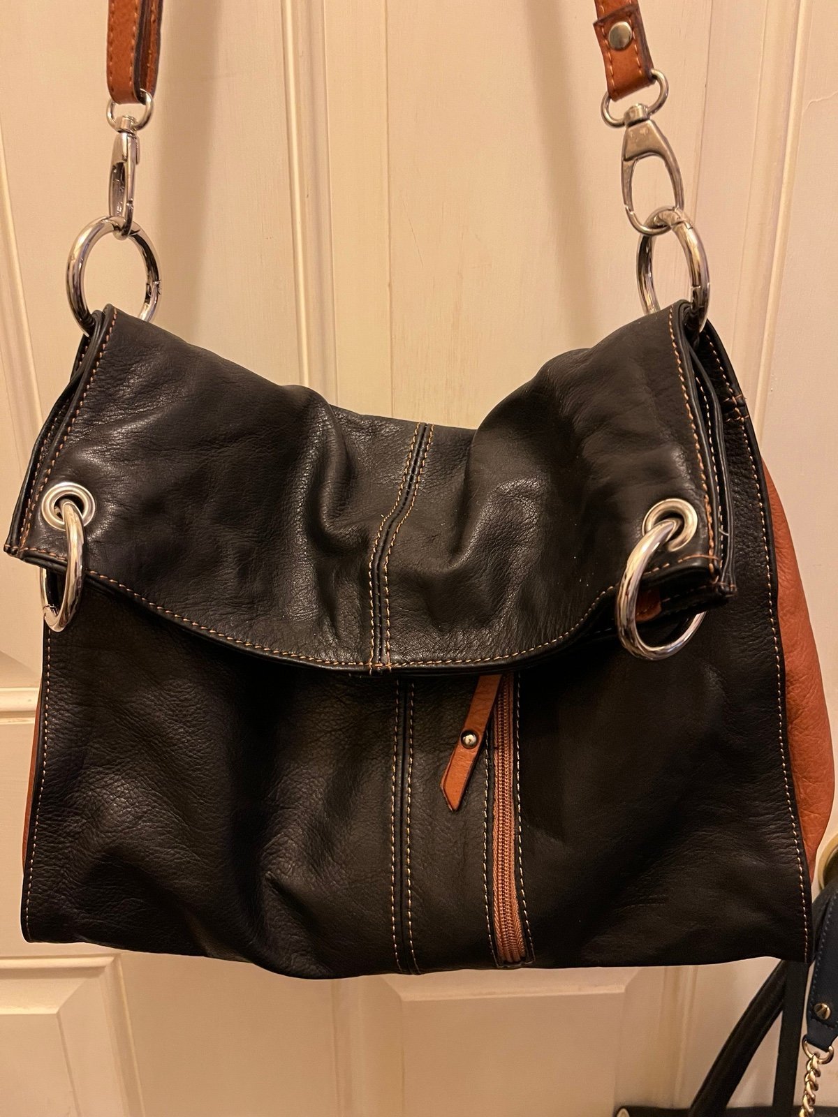 Black and brown leather bag.